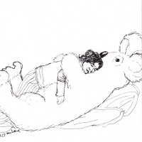 Pangzi cuddling a koala plushie